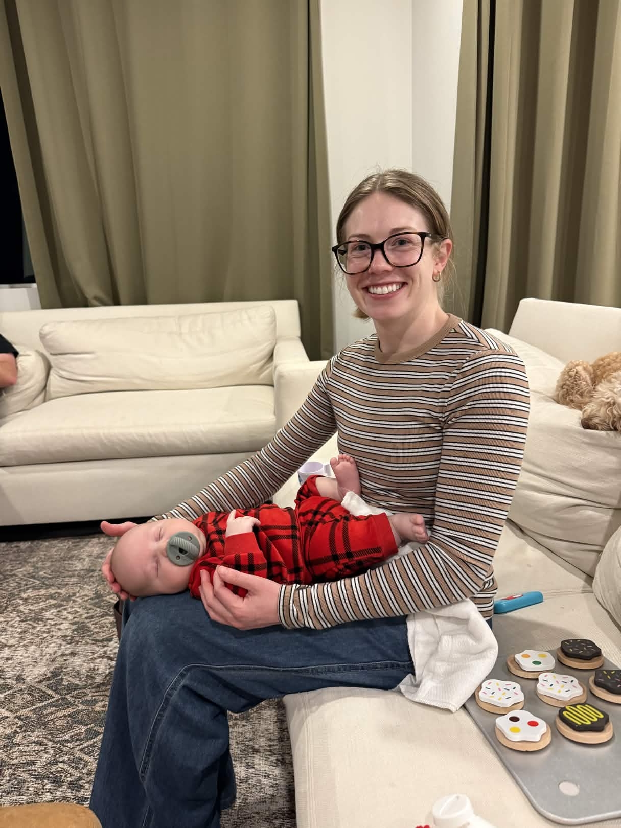 Kelli holding a baby